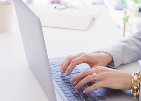 Typing on Laptop